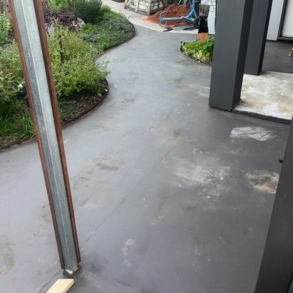 Before 12mm Oyster Travertine French Pattern tiles entrance | Hourigan Landscaping